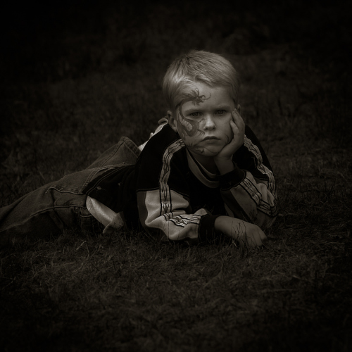 Kid watching the fair